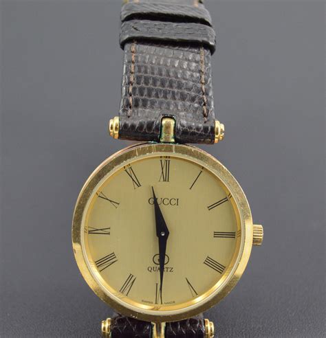 gucci watch gold black face vintage|old gucci watch value.